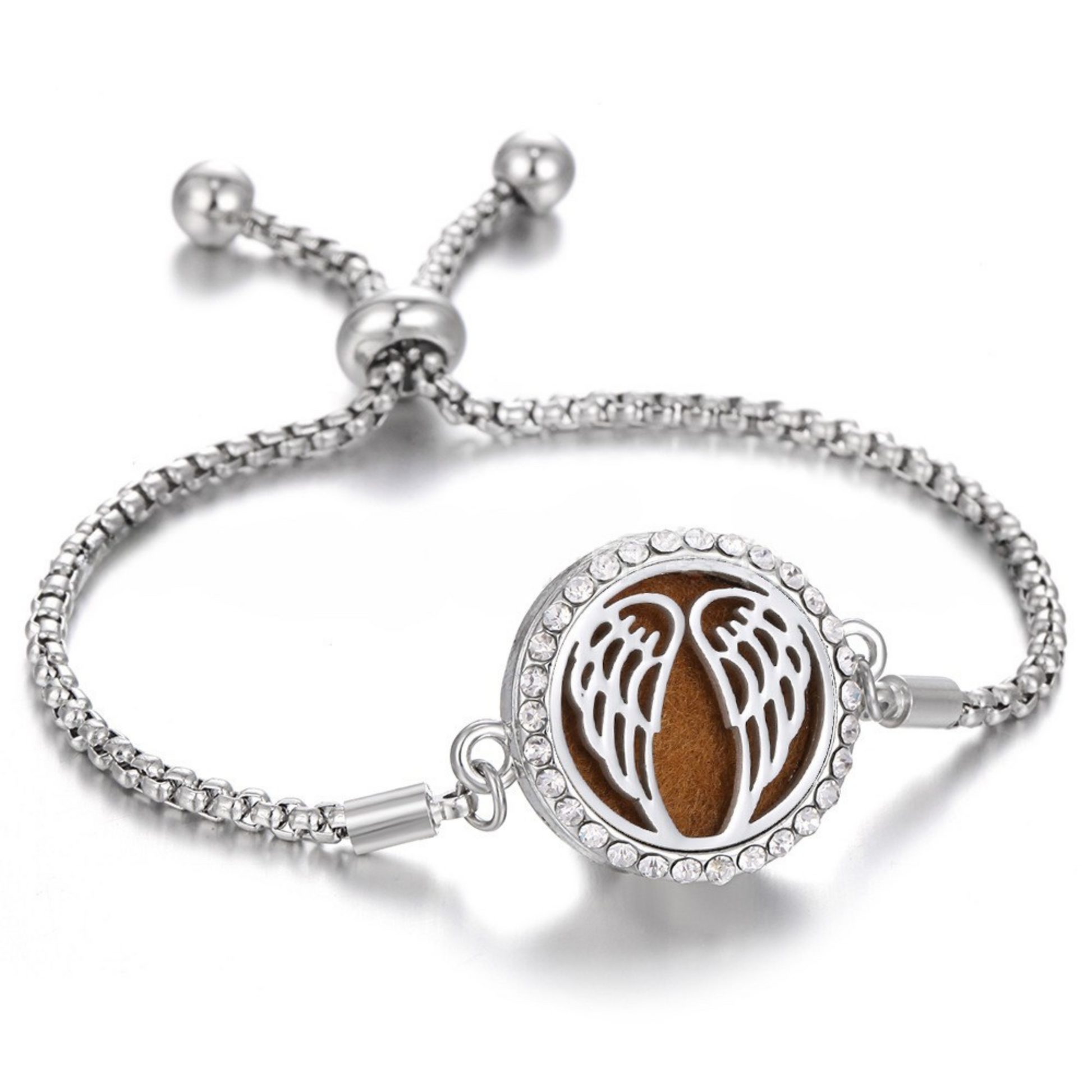 Silver fragrance bracelet with elegant wing design, featuring a brown background and sparkling crystal accents, combining style and functionality.