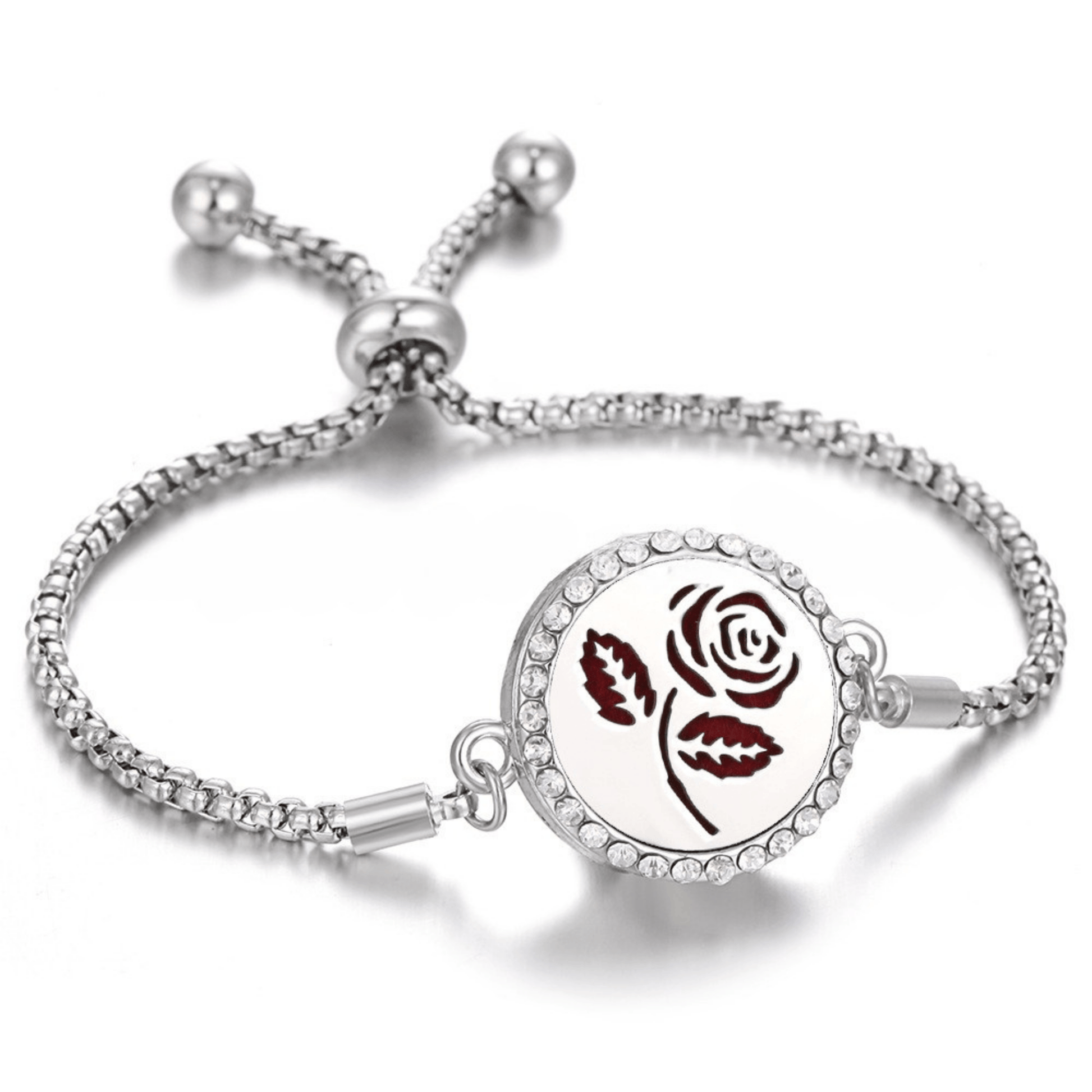 Elegant silver adjustable fragrance bracelet with a rose design centerpiece, surrounded by sparkling crystals, perfect for a stylish and aromatic accessory.