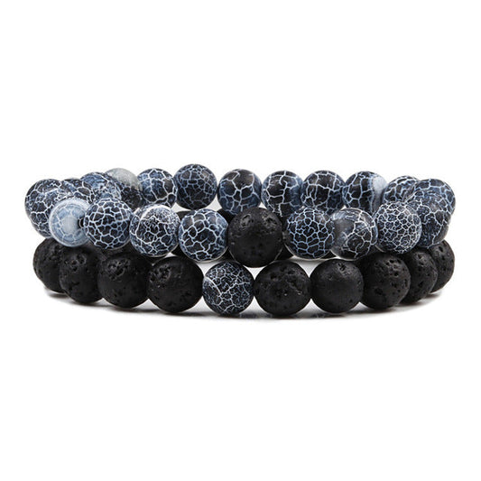 Weathered Black Volcanic Stone Bead Bracelet featuring classic volcanic stone texture with a rustic weathered finish, handmade on a durable elastic cord, ideal for grounding energy and everyday style